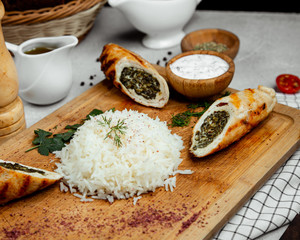 Rice served with meat roll