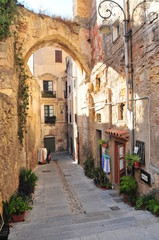 Fototapeta na wymiar Cagliari, Italy, September 2019. Narrow streets of city center, old town