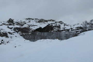 Preikestulen (Pulpit Rock) with snow in Norway in the spring
