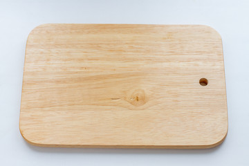 small wooden cutting board on a white background