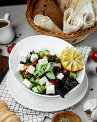 Shepherd salad topped with cheese