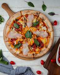 Mixed pizza topped with ham 1