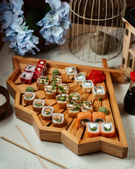 Various sushi sets with wasabi and ginger
