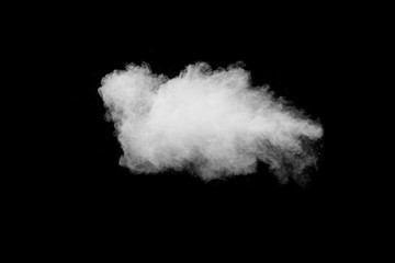 Obraz na płótnie Canvas White powder explosion isolated on black background.White dust particles splash.