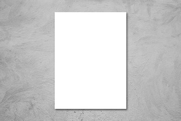 White poster on concrete wall. or blank paper labels on the cement wall.Information promoting ideas for marketing announcements and details.