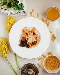 Pasta in tomato sauce with vegetables