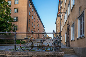 Old rusty biked in the narrow cobbled colorful streets of Stockholm in Autumn - 1