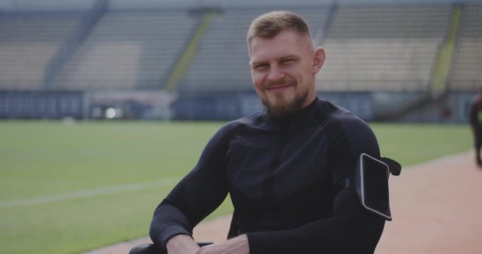 Wheelchaired athlete smiling at camera