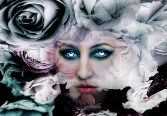 Witch with white burning eyes surrounded by flowers