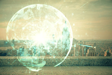 Double exposure of business theme hologram drawing and city veiw background. Concept of success.