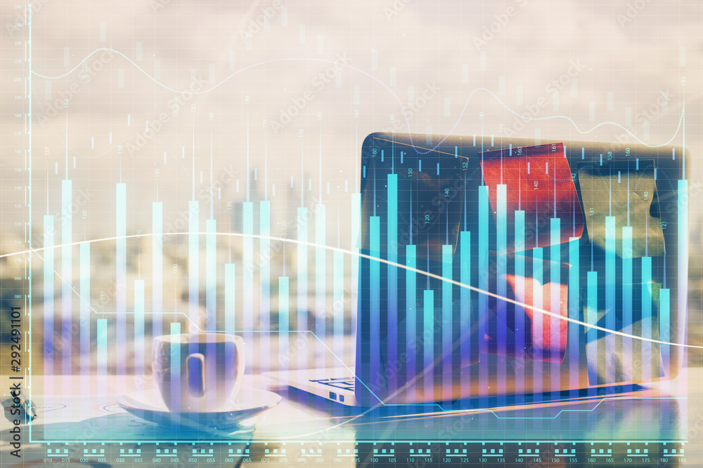 Wall mural financial graph colorful drawing and table with computer on background. double exposure. concept of 