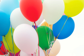 Close up of a bunch of colorful balloons