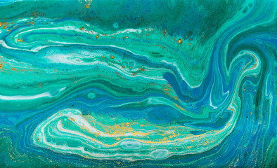 Green and blue agate ripples. Golden glitter marble texture.