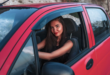 Fototapeta na wymiar girl driving a car