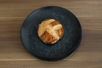 Turkish pastry products are Pogaca, Simit at patisserie on the wooden background.