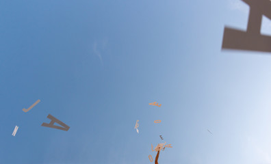 Flyting letters drop sky blue white books litterature