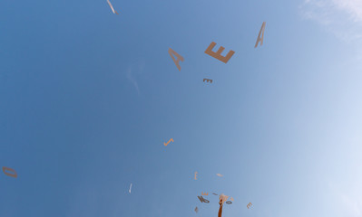 Flyting letters drop sky blue white books litterature