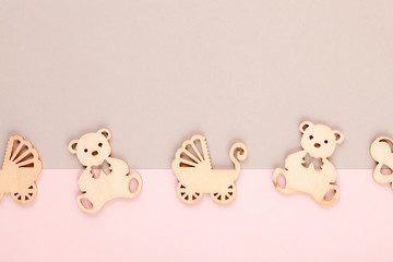 Minimal pastel decorative background with small wooden figures for newborn birthday