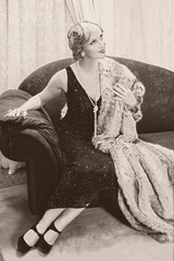 Vintage woman on chaise-longue