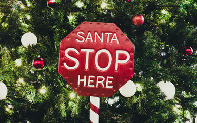 Realistic Christmas Red Stop Sign saying 