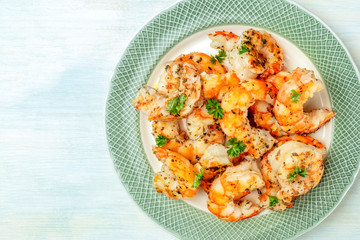 Cooked shrimps, shot from the top with copy space
