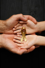 golden ribbon childhood symbol of the fight against cancer