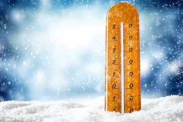Winter photo of thermometer and free space for your decoration. 