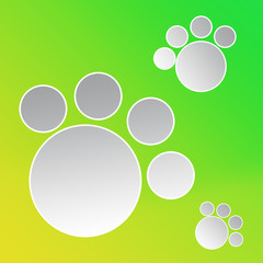 Paw prints of pets in cartoon style on a green yellow summer background abstract poster banner.  Cover design template  with abstract paws with empty space for text.