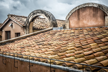 Ancient ceramic tiles on the roof. Rome, Italy