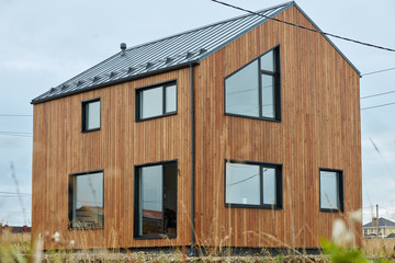 Sell two-storey house with slanting roof for big family in cozy space countryside