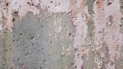Old weathered painted wall background texture. Dirty peeled plaster walls. Abstract colorful cement wall texture and background, high quality image.