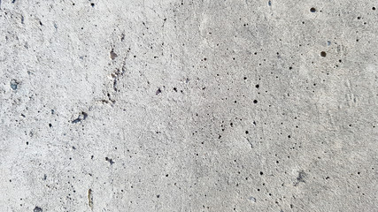 Beautiful concrete background with wood texture. Concrete wall flooring casing wood flooring texture. Mold traces for cement formwork.