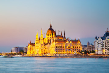 Fototapeta na wymiar Budapest parliament with danube reiver in the evening, Hungary