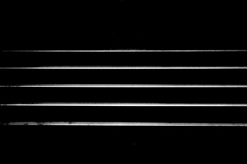 black background with white horizontal stripes