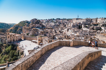 Fototapeta na wymiar Matera, Italy - August 2019: Historic center of Matera on a sunny August day
