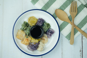 Steamed dumpling stuffed with garlic chives, taro and bamboo shoot