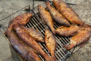 Smoked river fish cooked at the stake. 