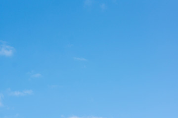 blue sky with light white clouds