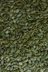 Background of raw green pumpkin seeds