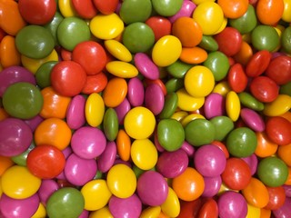 bonbon dragee candies. bonibon. top view confectionery background