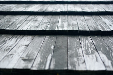 Old roof made of gray wooden planks. Close up