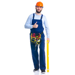 Man worker builder with helmet and tool belt, building level on white background isolation