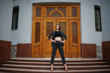 A tall leggy young beautiful and elegant model woman.