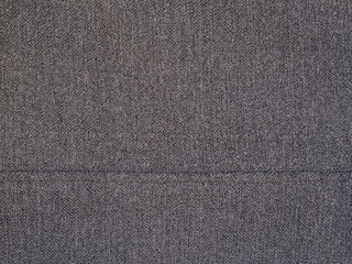 Fototapeta premium Gray woolen texture fabric. Cashmere. Solid background.