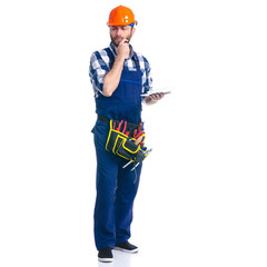 Man worker builder with helmet and tool belt, notebook, pen on white background isolation
