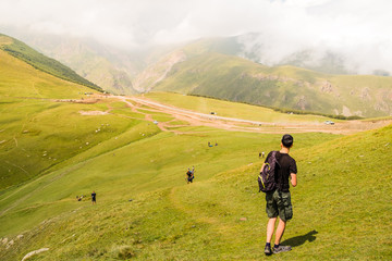 Obraz premium View of Caucasus Mountains and Stepantsminda village