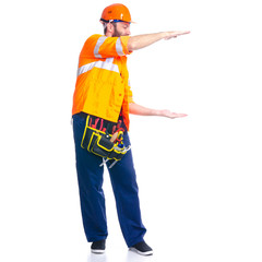 Man worker builder with helmet and tool belt on white background isolation