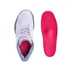 Modern mid-high white basketball shoes sneakers with orthotic inserts