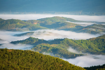 Fototapeta premium The mountains and mist in the morning are beautiful around the rainforest in Thailand.
