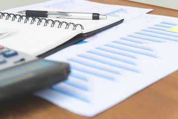 notebook and pen on the table